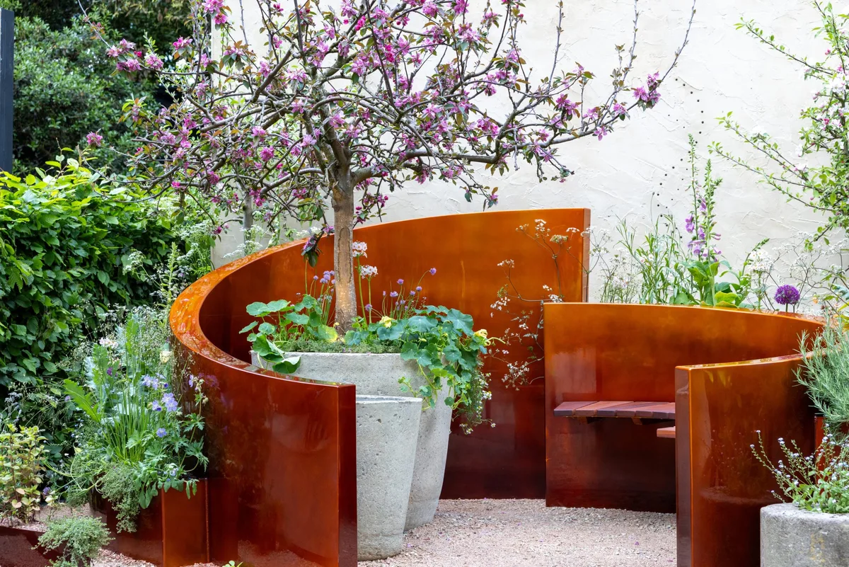 Alzheimers Society: Microbes and Minds Garden. Designed by Tina Worboys. Container Garden. RHS Chelsea Flower Show 2026. Site no. 808 Alzheimer's Society: Microbes and Minds Garden. Designed by Tina Worboys. Container Garden. RHS Chelsea Flower Show 2026. © RHS / Josh Kemp-Smith