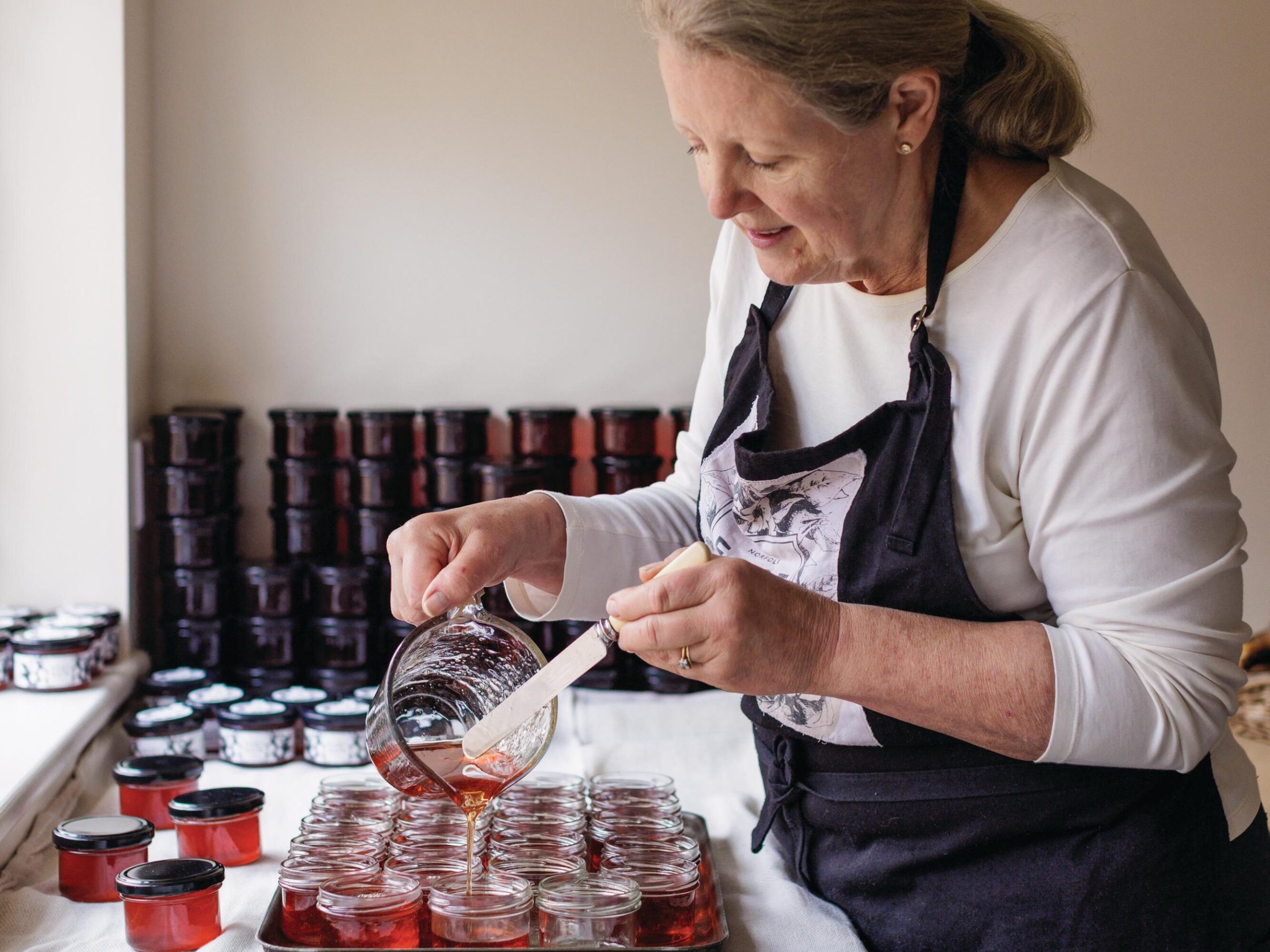 Woman making jelly