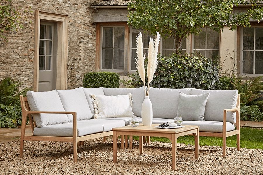 Cox & Cox Turin Corner Sofa Set on gravel outside a house