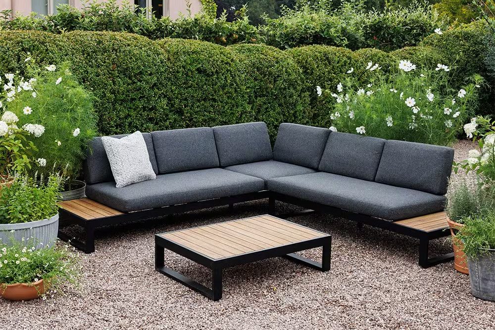 Crocus Amsterdam corner sofa set on a gravel patio