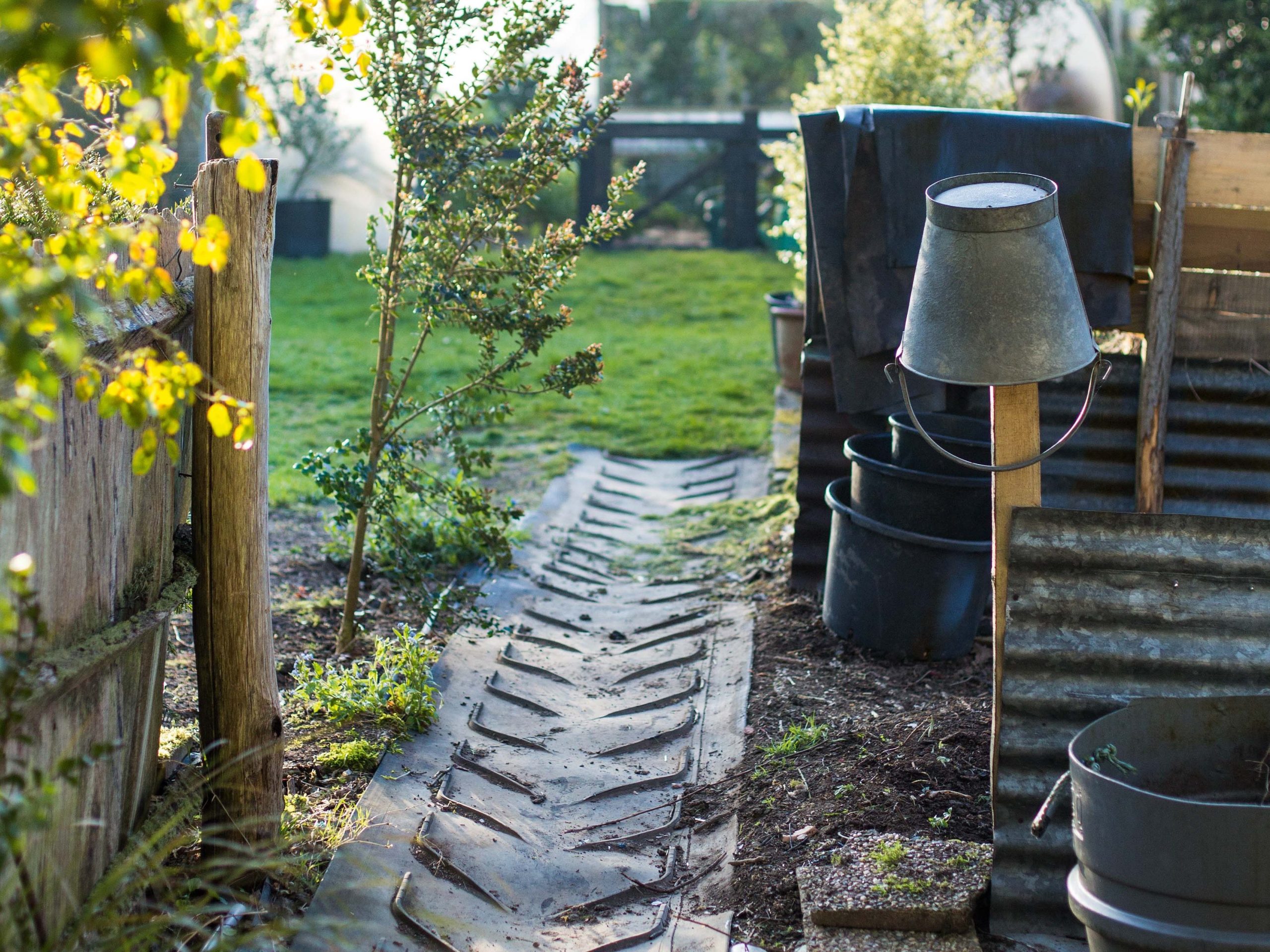 Industrial conveyor belt material used as path in Charlotte Molesworth's garden