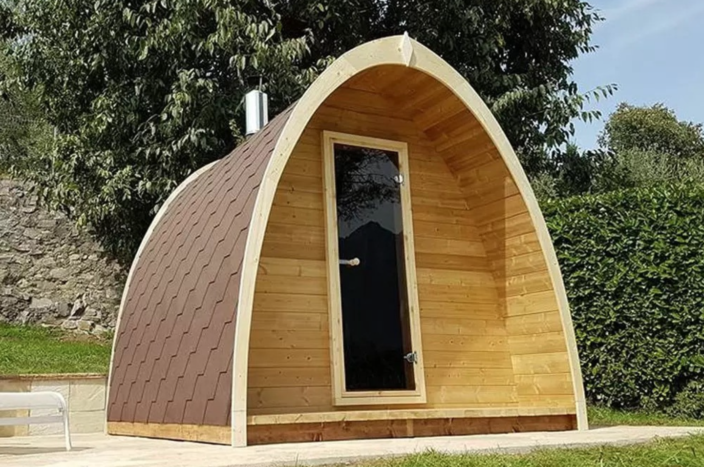 Stjarna Sauna Pod 300 in a garden