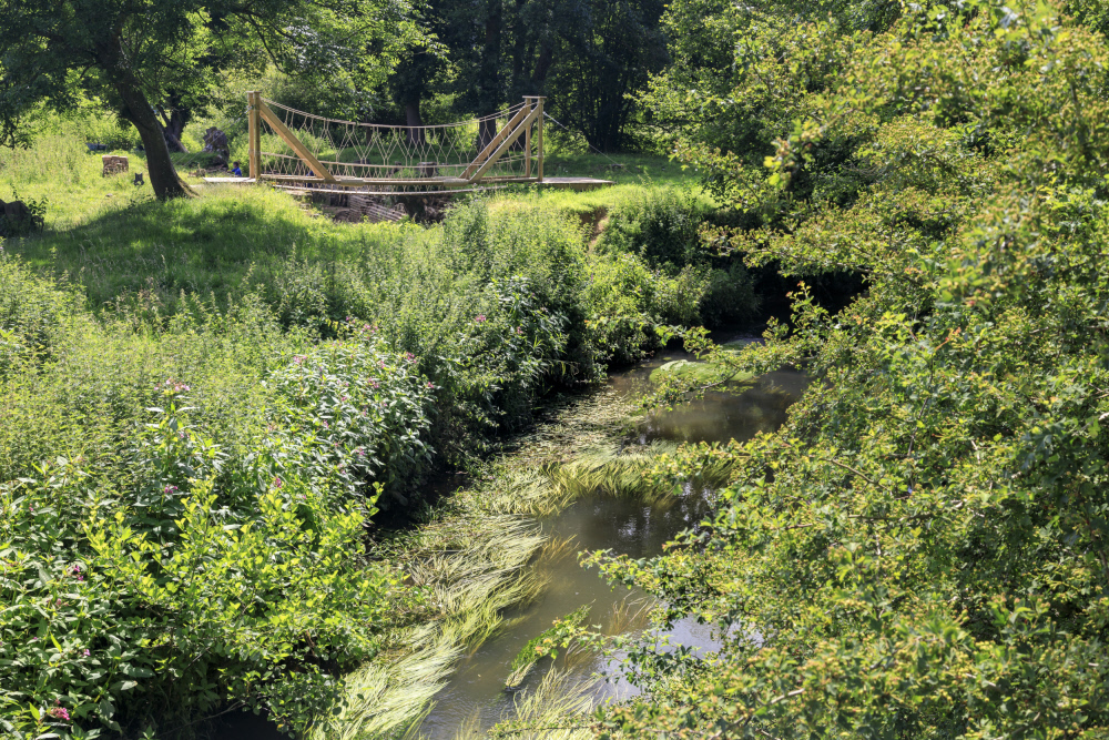 Rope bridge across the River Ouse at Sheffield Park