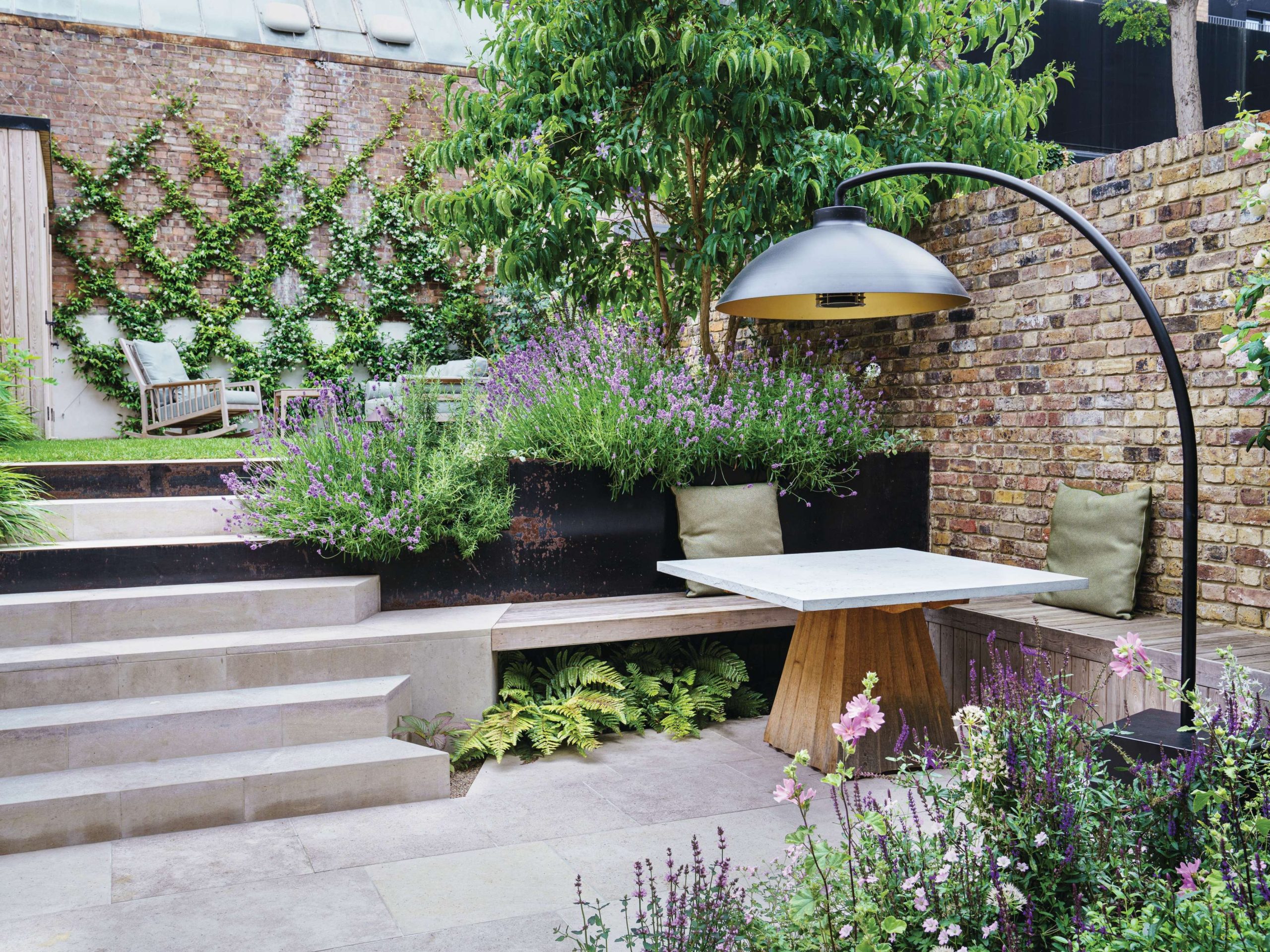 Walled courtyard garden with seating