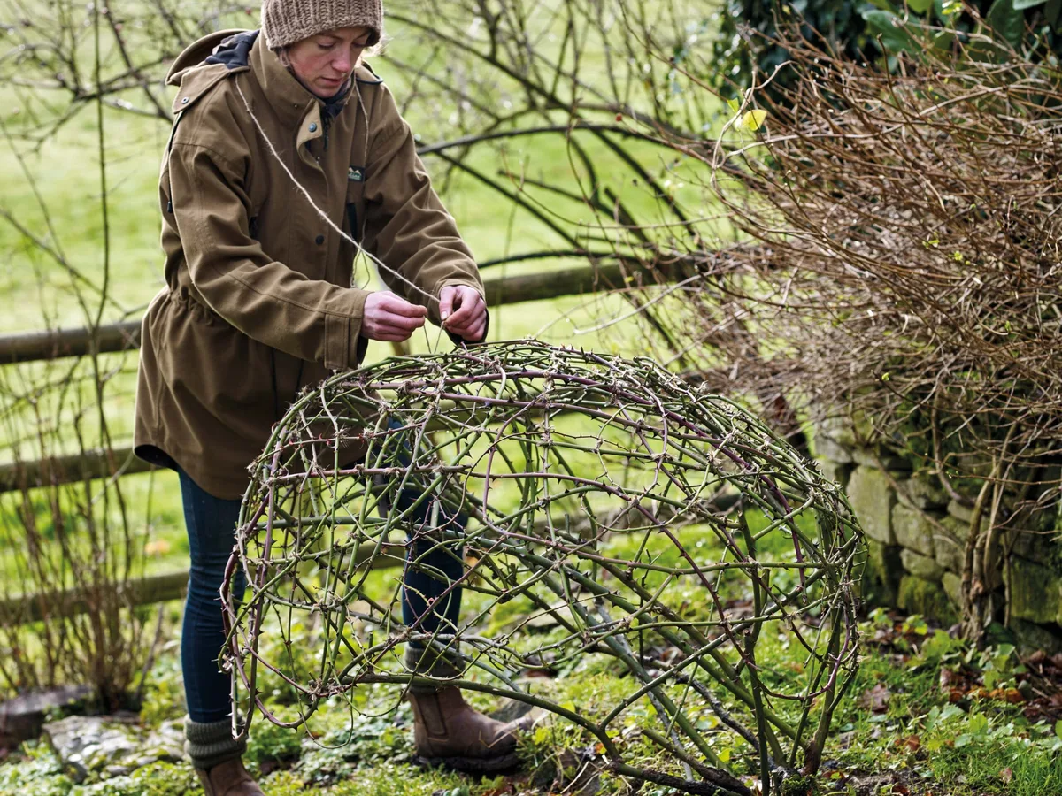 Jenny Barnes creating a rose sculpture Jenny Barnes creating a rose sculpture